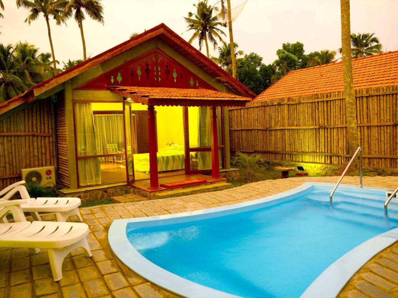Hotel Abad Whispering Palms Kumarakom Exterior foto