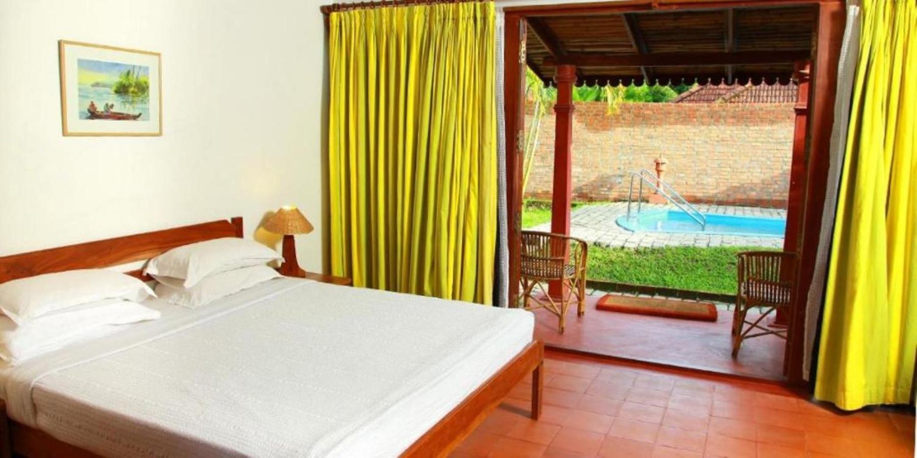 Hotel Abad Whispering Palms Kumarakom Exterior foto