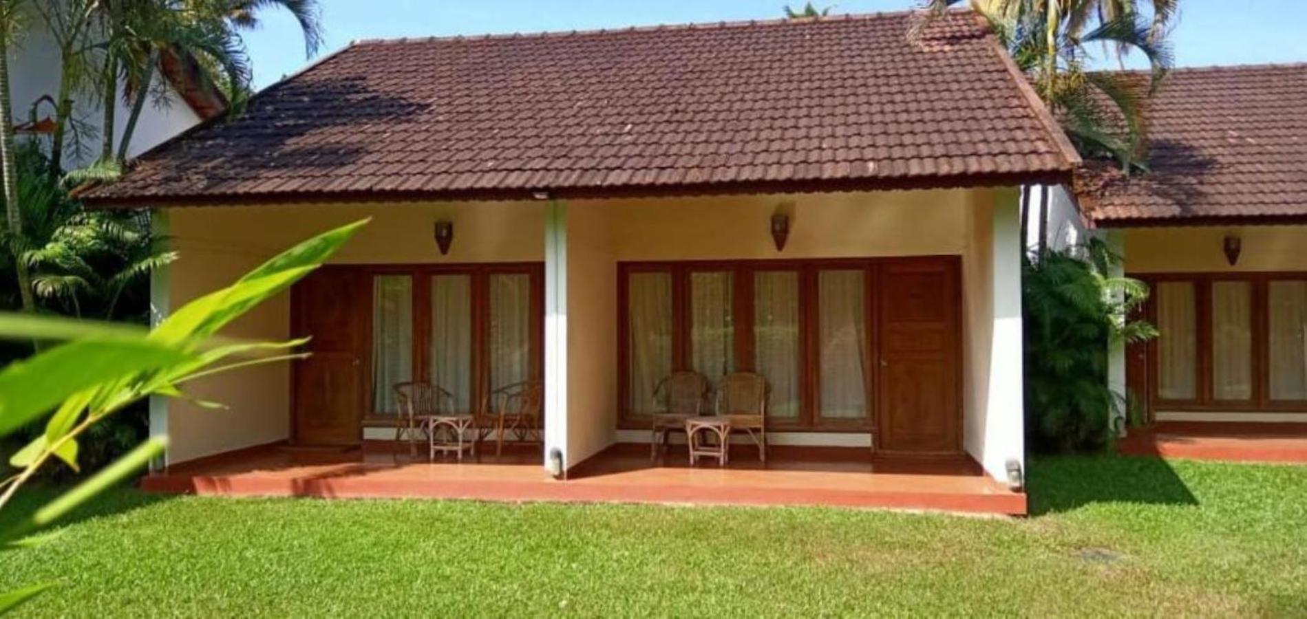 Hotel Abad Whispering Palms Kumarakom Exterior foto
